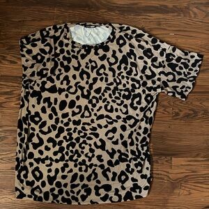 Fashion Nova (3) outfits size (XL) Camo, leopard, and charcoal grey.